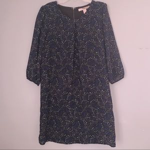 Black, white, and dark blue dress